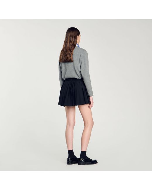 Jupe short plissee Sandro en coloris Bleu Lyst