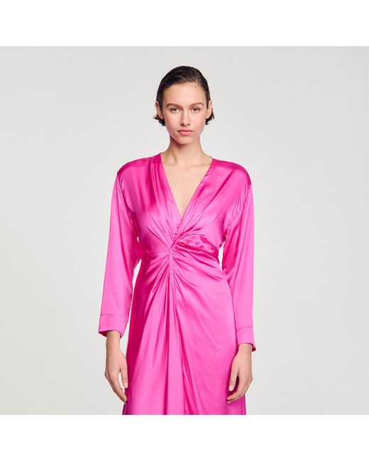 Robe longue drapée Sandro en coloris Pink