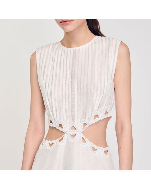 Robe courte à découpes Sandro en coloris White