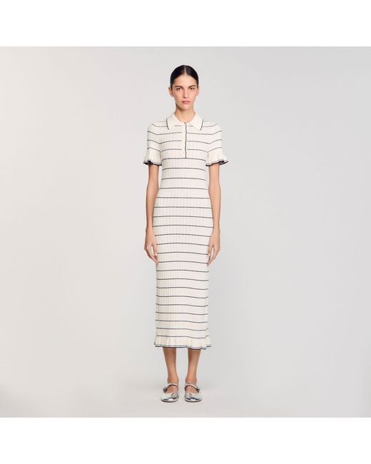 Robe longue en maille à col polo Sandro en coloris White