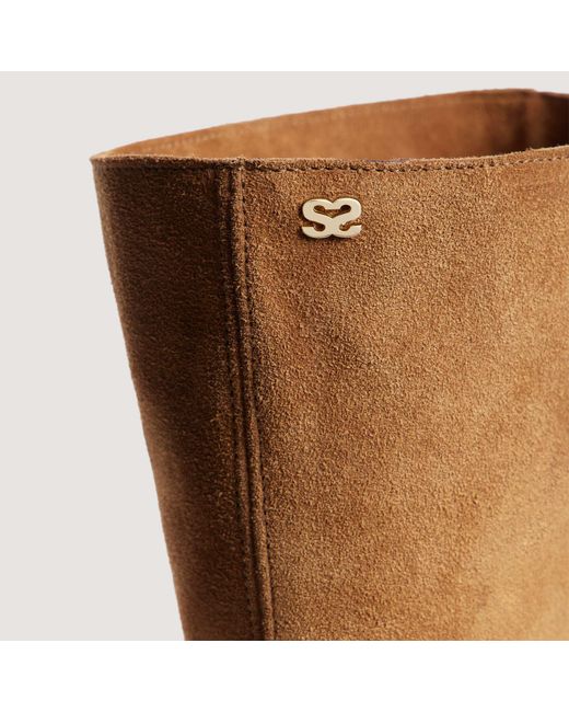 Bottes en suède Sandro en coloris Brown