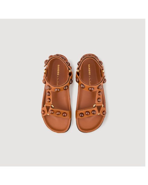 Sandales cloutées Sandro en coloris Brown