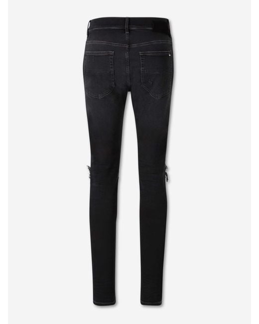 Amiri Blue Ripped Skinny Jeans for men