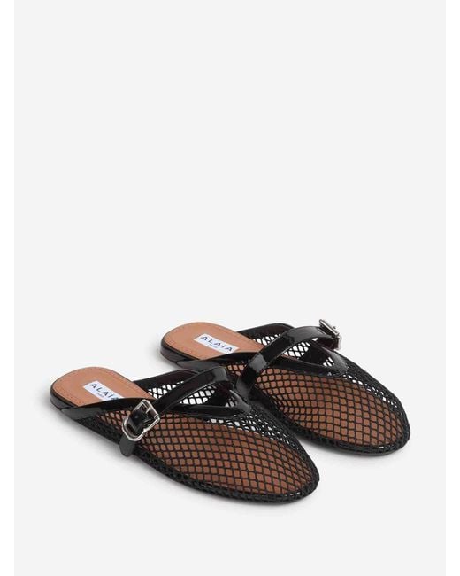 Alaïa Black Flat Openwork Mules