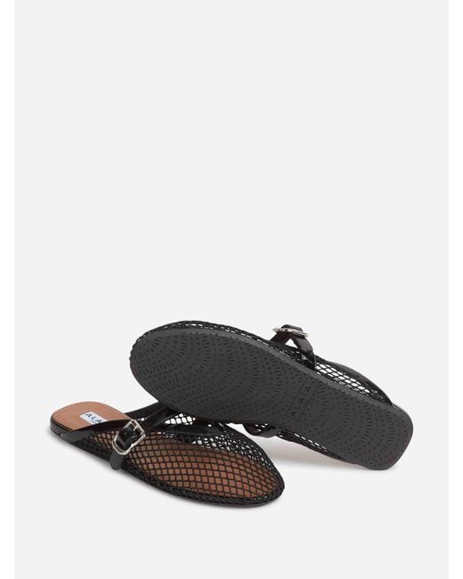 Alaïa Black Flat Openwork Mules
