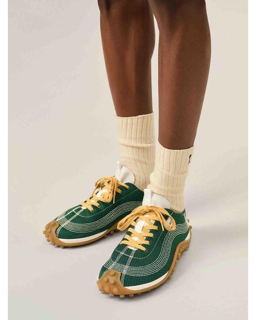AMI Green Bottle Cumin Running Sneakers for men