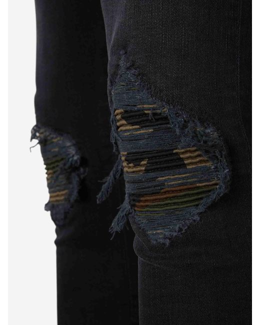Amiri Blue Ripped Skinny Jeans for men