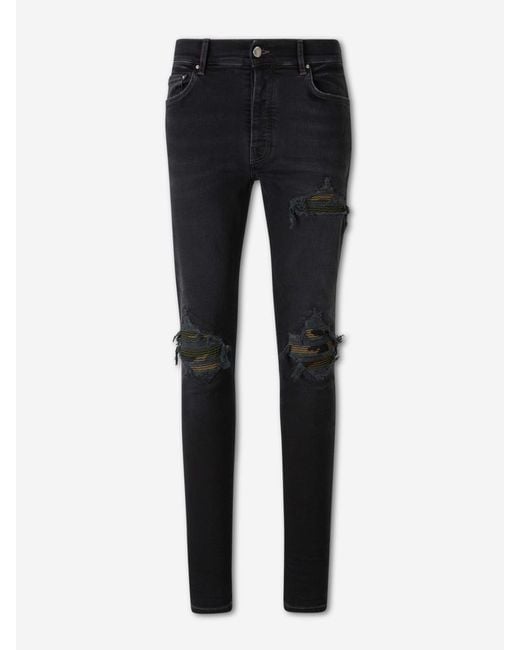 Amiri Blue Ripped Skinny Jeans for men