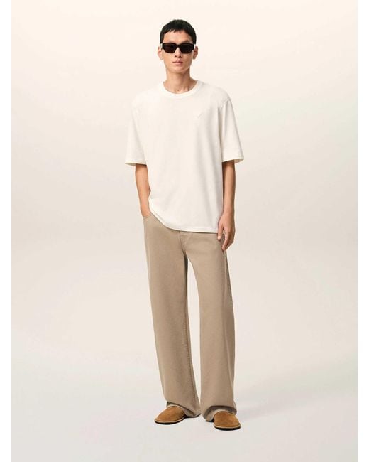 AMI Natural Wide Leg Cotton Jeans for men