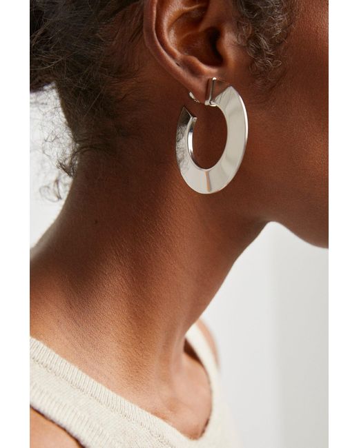 Alaïa White Blade Hoops Small Silver Earrings