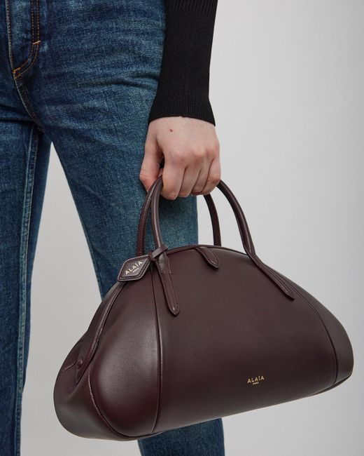 Alaïa Black Top Handle Small Burgundy Bag