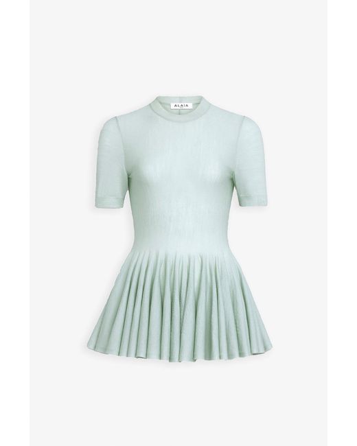 Alaïa Green Peplum Light Blue Top