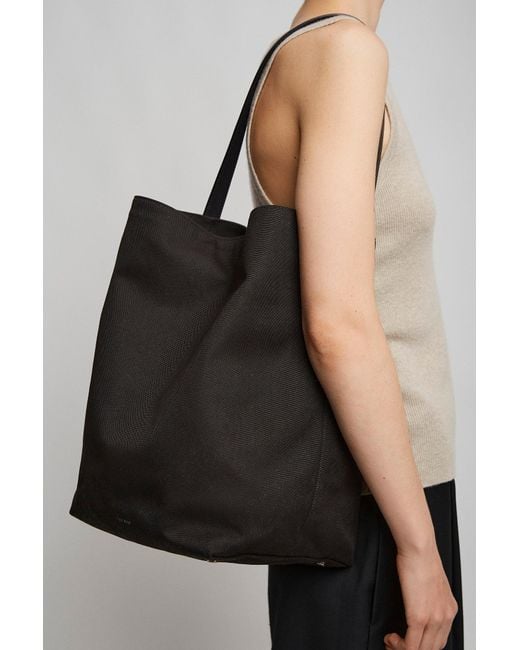 The Row Large N/s Black Canvas Tote Bag