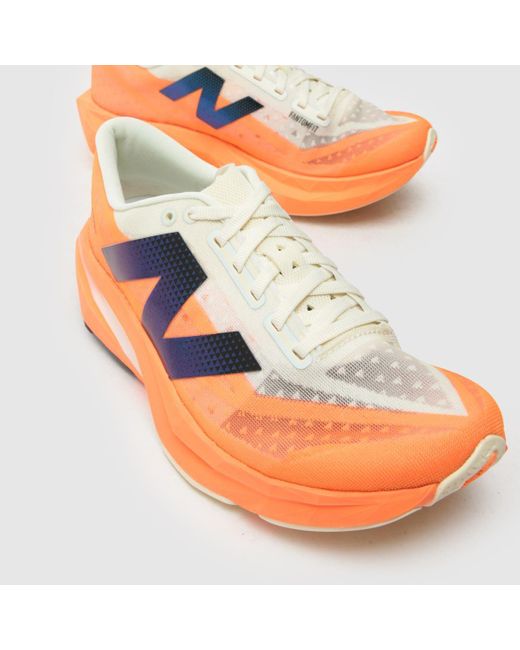 New Balance Orange Fuelcell Rebel V4 Trainers
