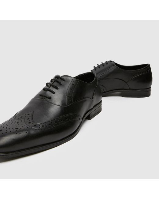 Schuh Black Row Leather Brogue Shoes In for men