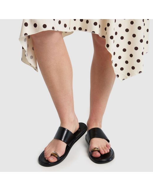 Schuh Black Thyme Metal Toe Loop Sandals