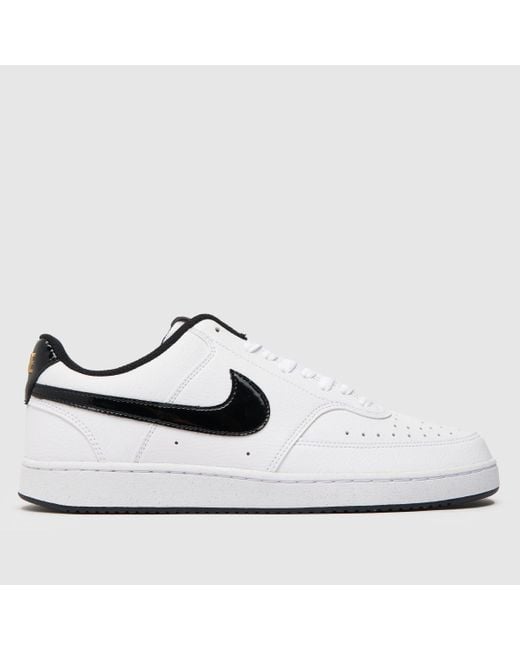 nikewhite & black court vision low trainers