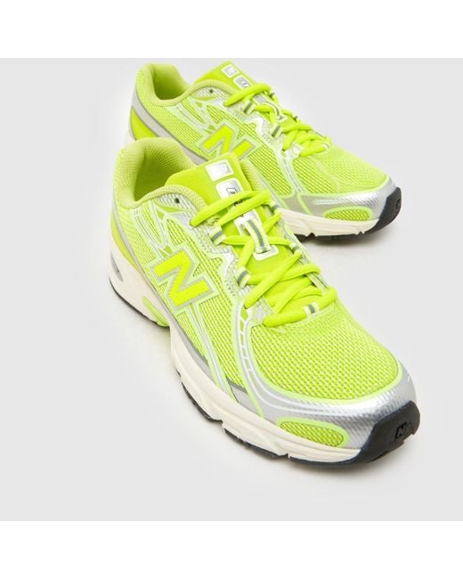 New Balance Yellow 740 Trainers