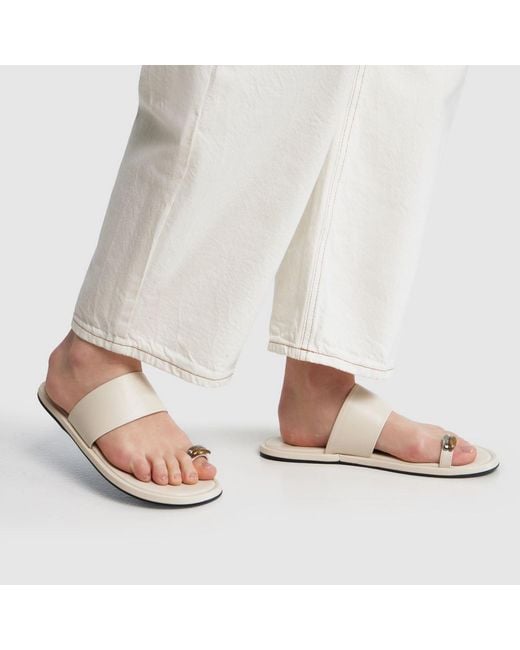 Schuh Metallic Thyme Metal Toe Loop Sandals