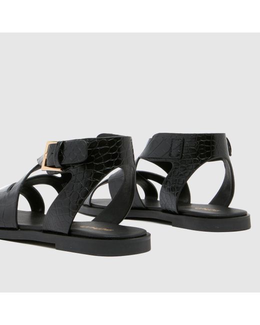 Schuh Black Tide Croc Flat Sandals In