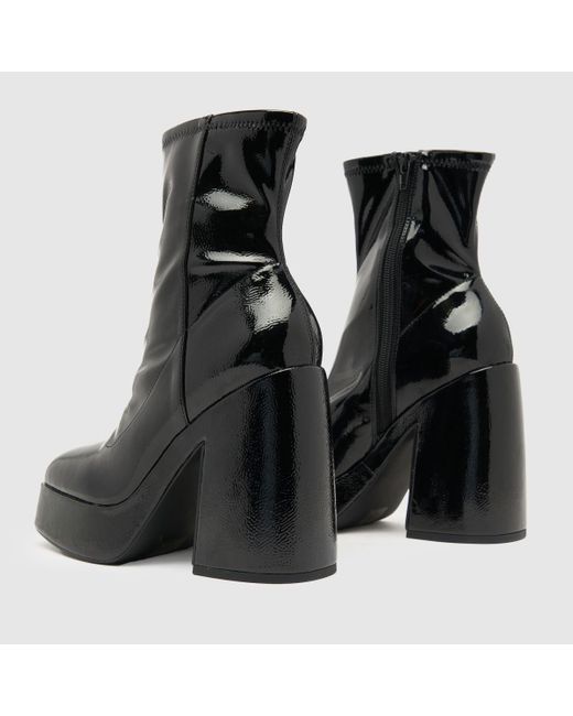 Schuh Black Women's Brogan Patent Platform Boots