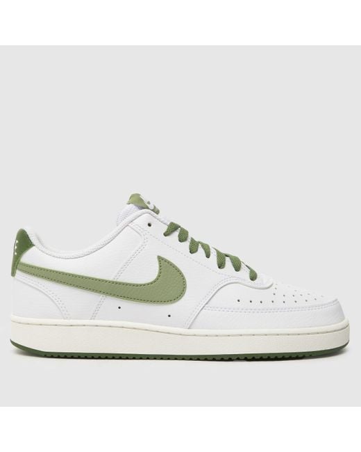 nike green and white trainers