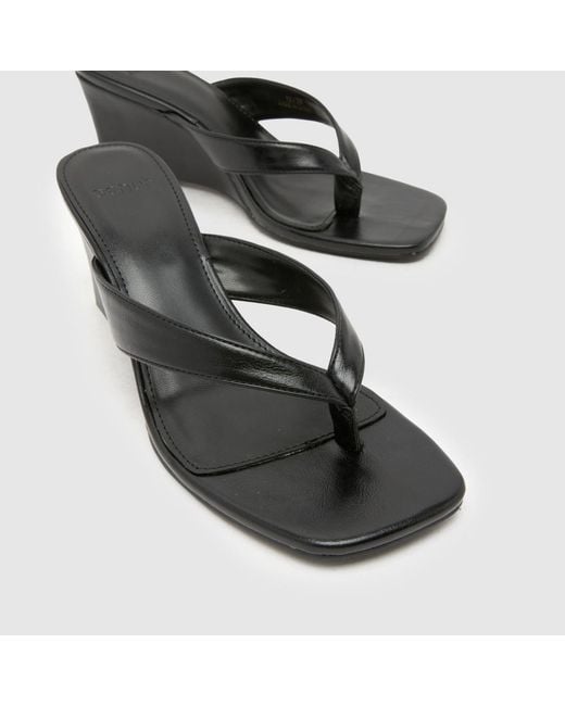 Schuh Black Solomon Wedge Toe Post High Heels