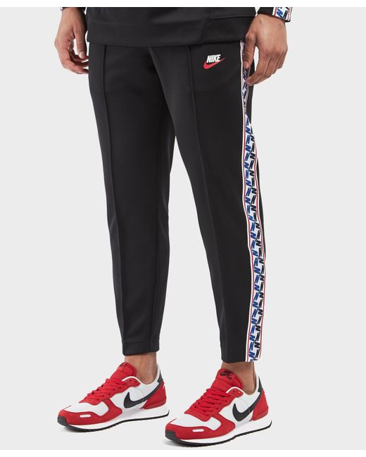 Nike Synthetic Taped Poly Track Pants in Black for Men | Lyst Canada