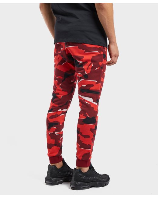 Nike Club Camo Cuffed Fleece Pants in Red for Men | Lyst