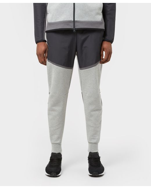 Nike Cotton Tech Woven Track Pants in Grey (Grey) for Men Lyst