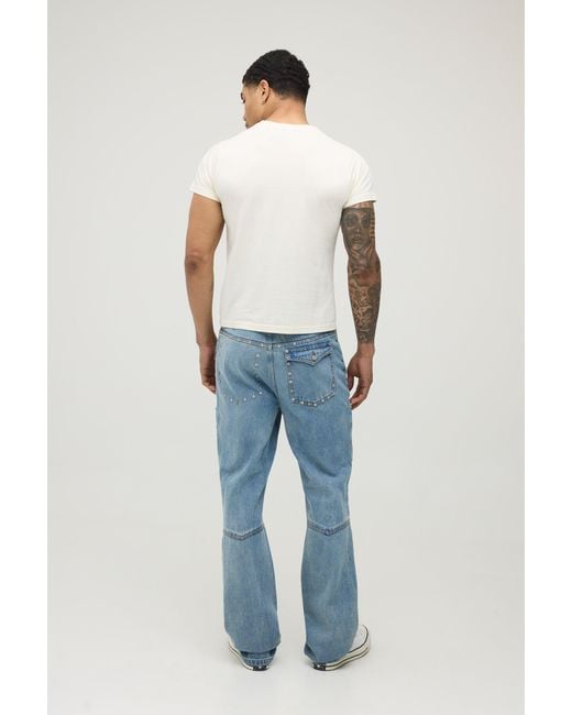 BoohooMAN Blue Studded Carpenter Stacked Slim Flared Jeans for men