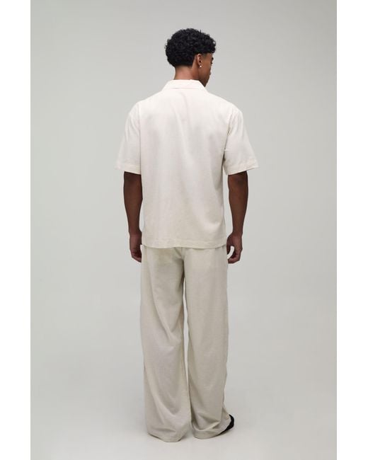 BoohooMAN Natural Baggy Fit Linen Blend Small Floral Embroidery Trousers for men