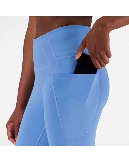 New Balance Dames Shape Shield 7/8 High Rise Pocket Tights In Blauw in het Blue