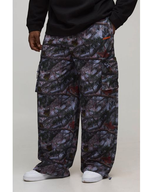 BoohooMAN Black Plus Elasticated Waist Nylon Camo Baggy Trousers for men