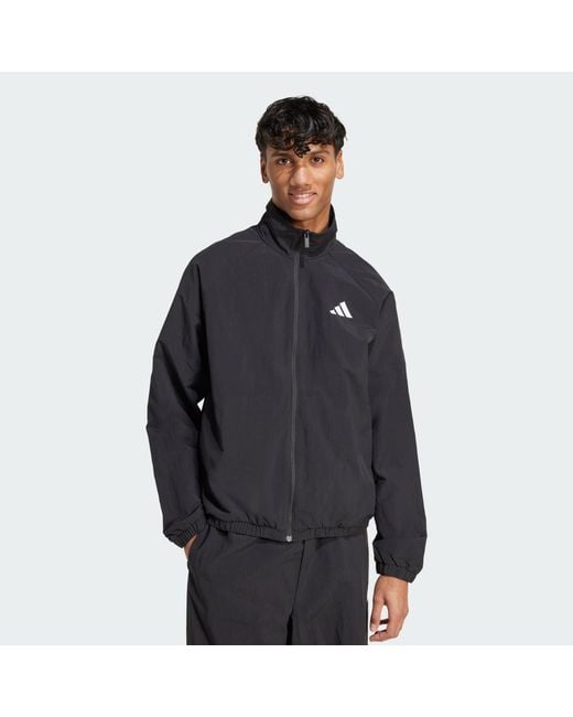 Adidas Black Essential Small Logo Windbreaker for men