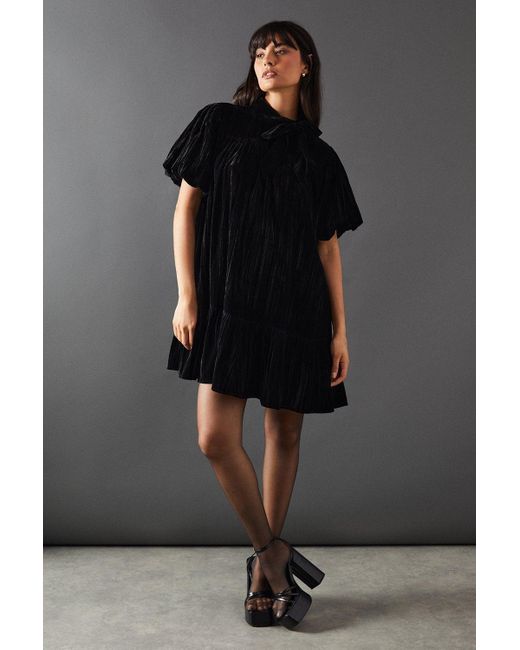 Warehouse Black Velvet Crinkle Tie Neck Puff Sleeve Tier Hem Mini Dress