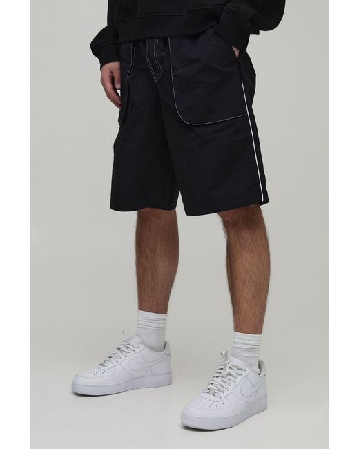 BoohooMAN Black Baggy Long Length Contrast Stitch Nylon Short for men