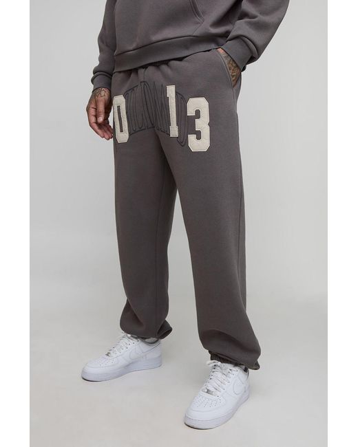 BoohooMAN Gray Tall Baggy Fit Worldwide Applique Joggers for men