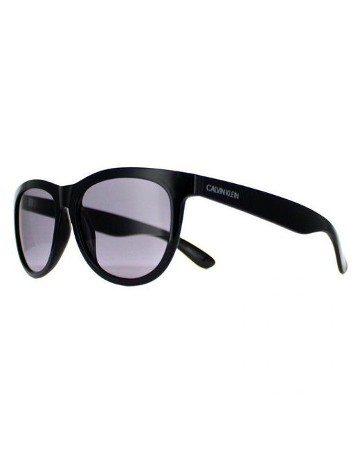 Calvin Klein Brown Round Smoke Ck19567S for men