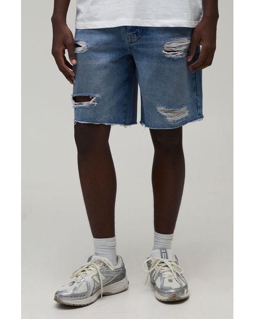 BoohooMAN Blue Relaxed Fit Ripped Washed Denim Shorts for men