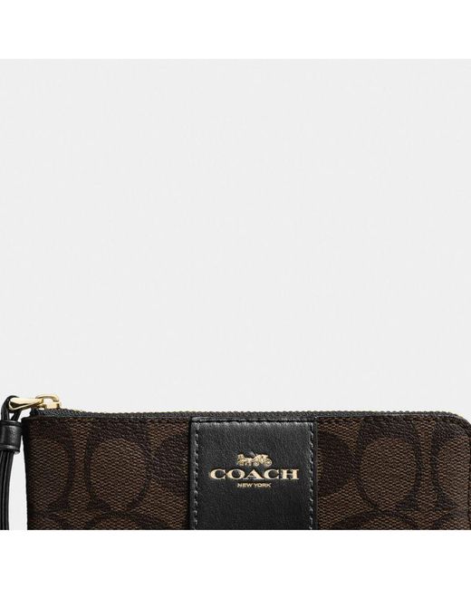 COACH White Signature Pvc With Leather Stripe Corner Zip Bag
