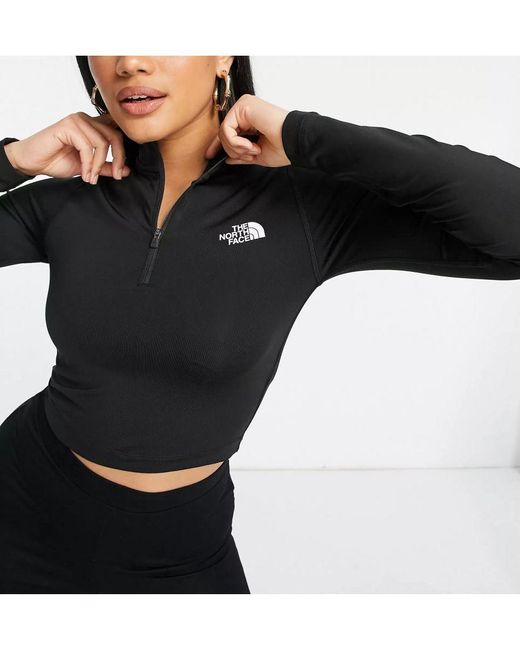 The North Face 1/4 Zip Fitted Cropped Long Sleeve Top In Black