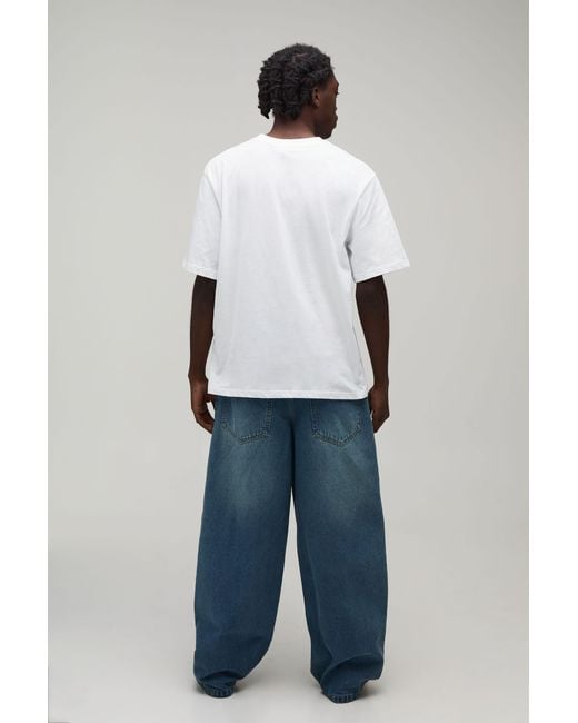 BoohooMAN Blue Antique Wash Graffiti Print Super Baggy Jeans for men