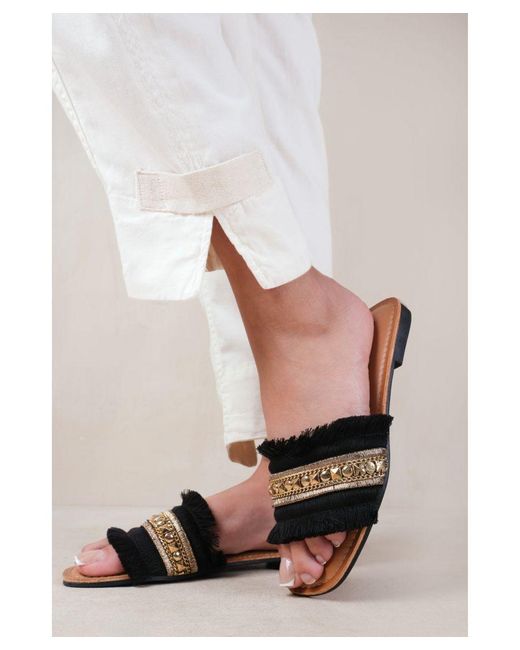 Where's That From White 'Astroid' Flat Sandals With Fringe Trim And Stud Details