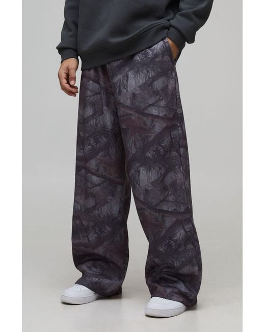 BoohooMAN Black Wide Leg Washed Camo Jogger for men