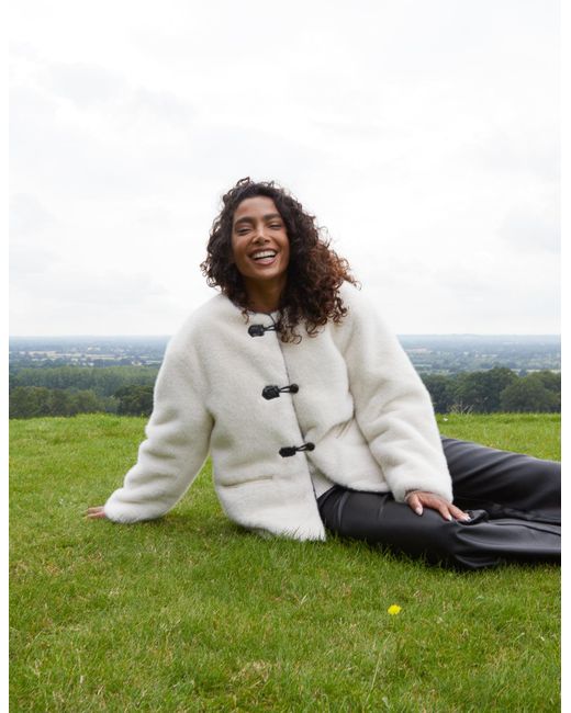 Blue Vanilla Green Collarless Toggle Detail Faux Fur Jacket