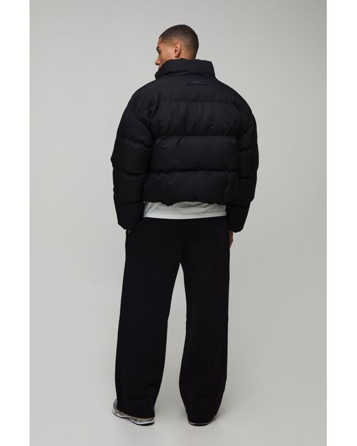 BoohooMAN Black Boxy Fit Essential Midweight Padded Funnel Neck Puffer Jacket for men