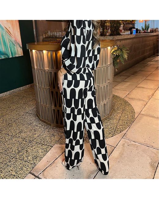 AX Paris Black And Cream Printed Geometric Trousers
