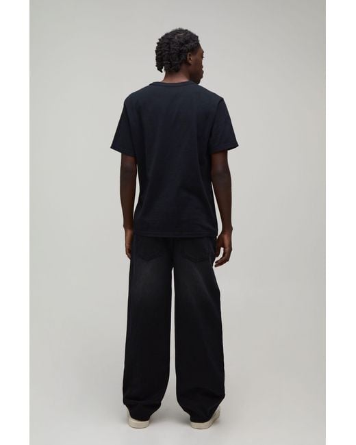 BoohooMAN Black Cow Applique Relaxed Fit Jeans for men