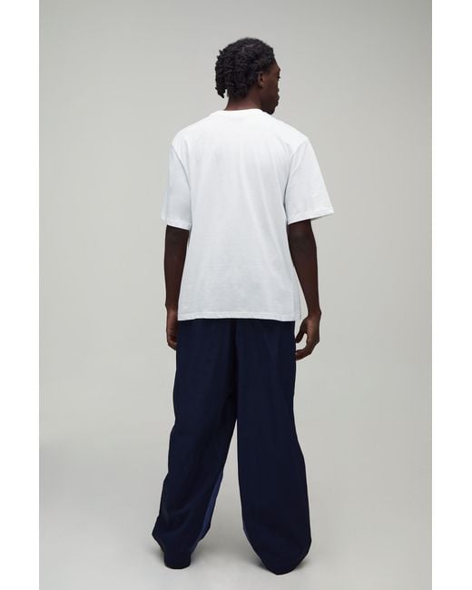 BoohooMAN Blue Baggy Fit Colour Block Track Pants for men